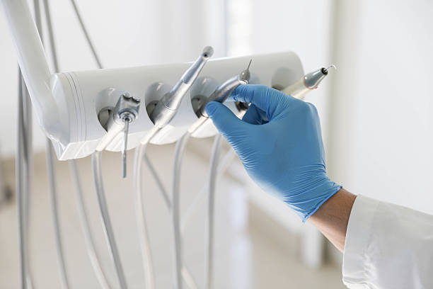 Professional Emergency Dentist technician working in Greensboro, NC